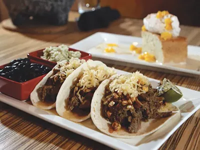 Mole verde brisket tacos and Barrio tres leches from Barrio in Birmingham.