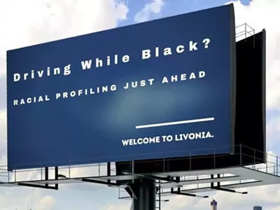 Billboard in Redford Township calls out racial profiling by Livonia police.