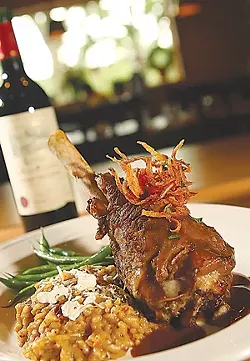 Braised Australian lamb shank with sun-dried tomato and chevre risotto. - MT Photo: Rob Widdis