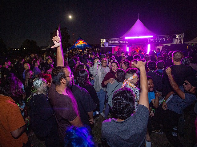 Revelers dance under the moon at Charivari Detroit Festival 2022.