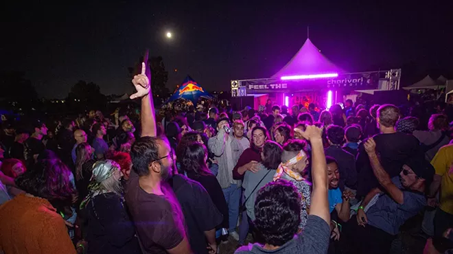 Revelers dance under the moon at Charivari Detroit Festival 2022.