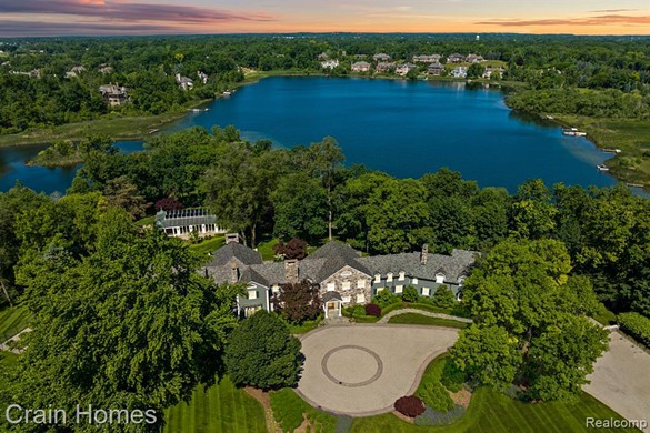 1. 2600 Turtle Lake Dr., Bloomfield Township
Price: $14.9 million
This East Coast-style estate, located in the gated community of Turtle Lake, is exclusive and secluded. The 1920s architecture 6-bedroom waterfront home rests upon 7.75 acres of landscaped grounds. 
