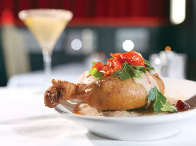 Chicken Fried Duck" — duck confit cassoulet with white bean gravy, sausage and cornichon relish — from Rodin in Detroit.