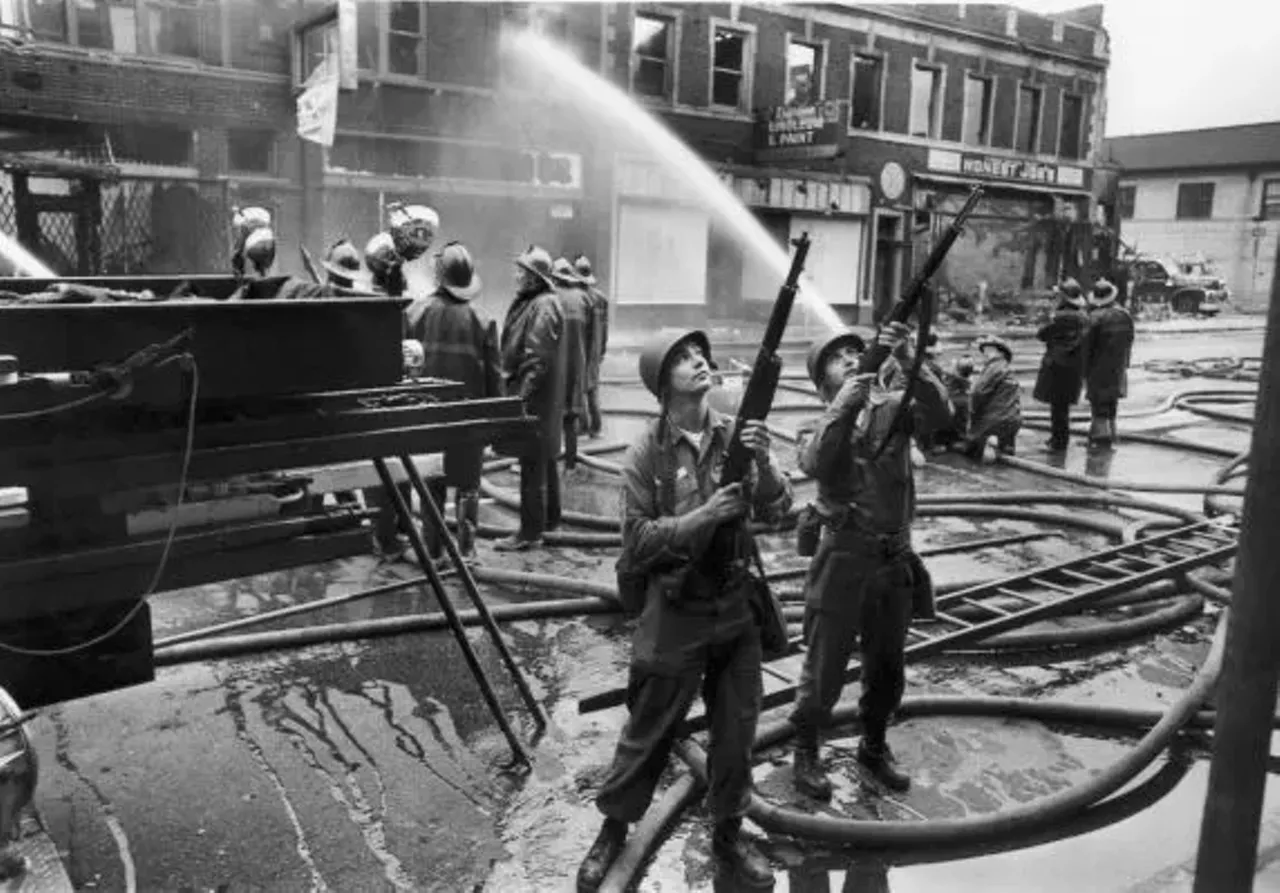 The fires started during the riot spread rapidly in the afternoon heat and as 25 mile per hour winds began to blow. Even as businesses and homes went up in flames, firemen were increasingly subject to attack by the rioters, and National Guard troops were assigned to protect firefighters on the streets.