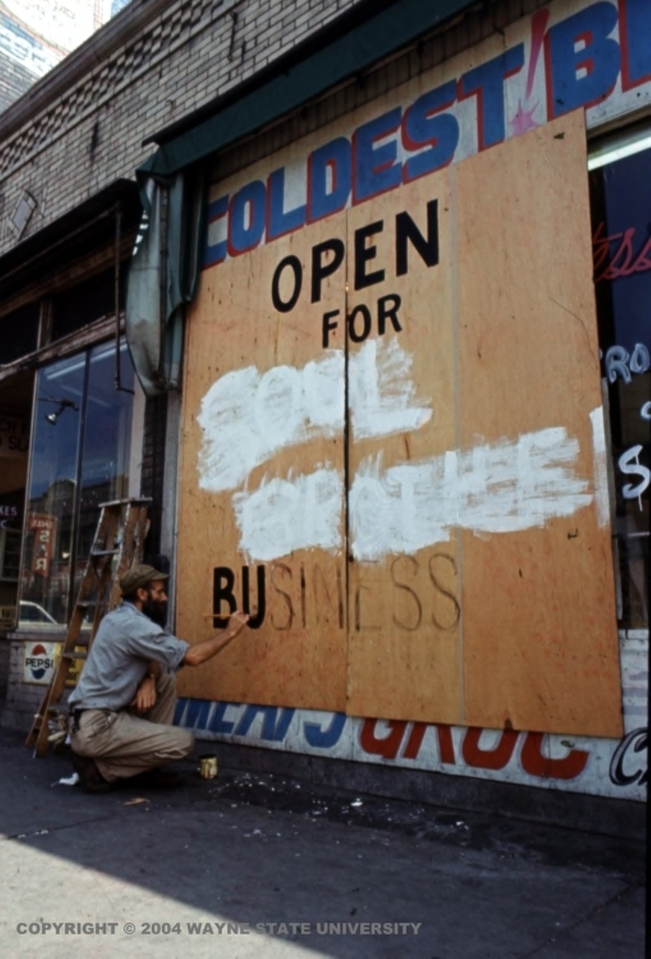 After the riots, businesses left standing continued on despite damage to their buildings and neighborhoods.