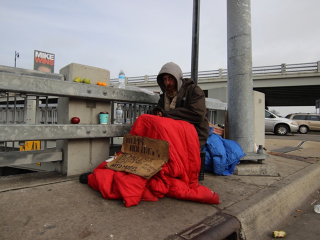 A man on Eight Mile Road in Detroit experiencing homelessness.