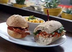 Combo plate of barbecue tofu slider (left) mac and cheese (back) and bánh mì chay sandwich (right), from the Lunch Room in Ann Arbor. - ROBERT WIDDIS