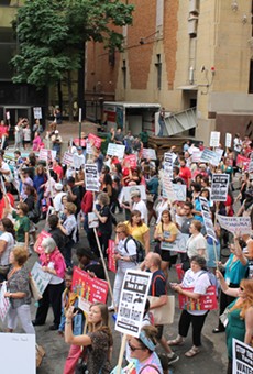 More than 1,000 people demonstrated in the streets of downtown Detroit against the city's ongoing water shutoffs on July 18, 2014. The protest was organized by the National Nurses United.