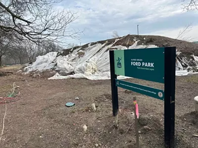 A large mound of dirt at the entrance of A.B. Ford Park.