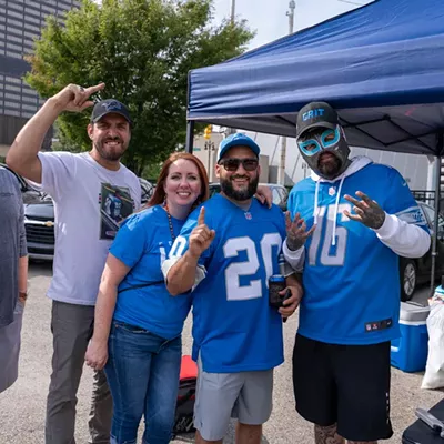 Image: Detroit Lions fans show team spirit at first home game of the season