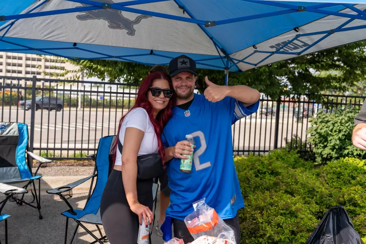 Image: Detroit Lions fans show team spirit at first home game of the season
