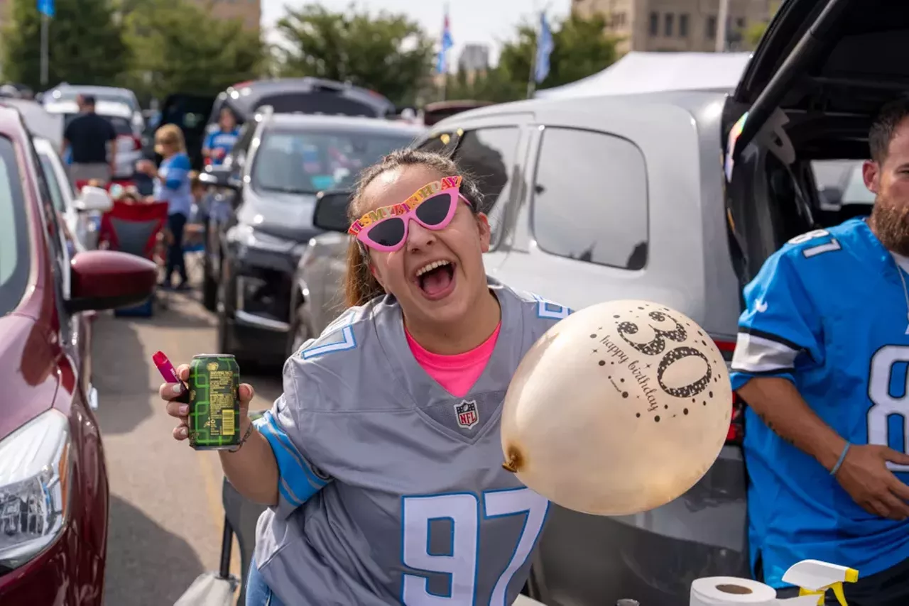 Image: Detroit Lions fans show team spirit at first home game of the season