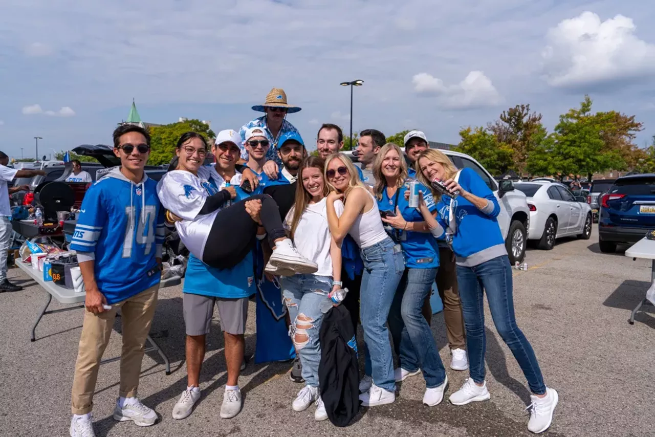 Image: Detroit Lions fans show team spirit at first home game of the season