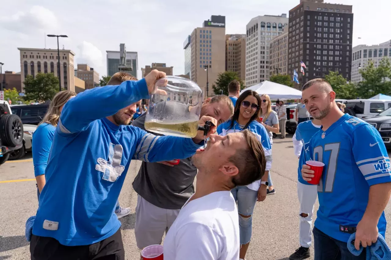 Image: Detroit Lions fans show team spirit at first home game of the season