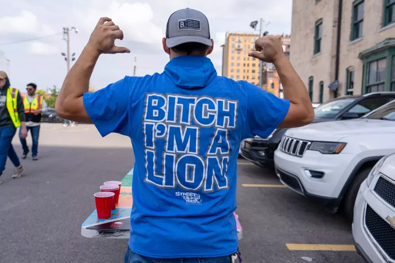 Image: Detroit Lions fans show team spirit at first home game of the season