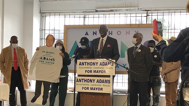 Detroit mayoral candidate Anthony Adams brings out a cardboard cutout of Mayor Mike Duggan, who has refused to debate him.