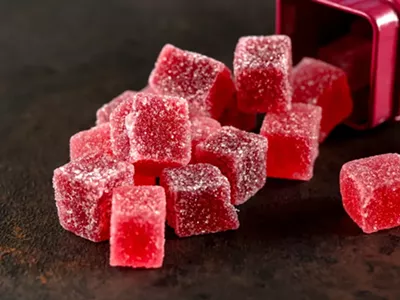 A mentor at the Detroit Juvenile Detention Facility is accused of giving marijuana-infused gummies to teenagers.
