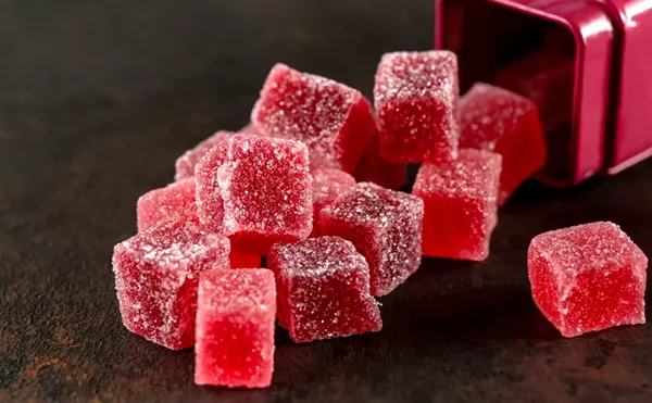 A mentor at the Detroit Juvenile Detention Facility is accused of giving marijuana-infused gummies to teenagers.