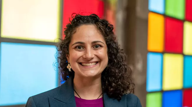 Samantha Woll poses at Detroit’s Isaac Agree Downtown Synagogue.