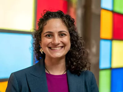 Samantha Woll poses at Detroit’s Isaac Agree Downtown Synagogue.