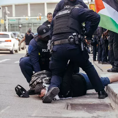 Taj was thrown to the ground and handcuffed by DPD.