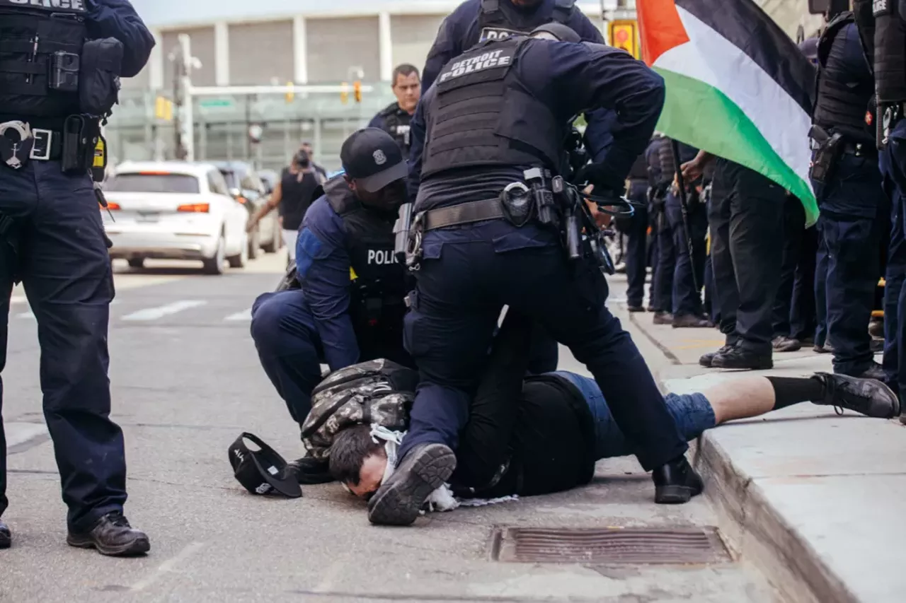 Taj was thrown to the ground and handcuffed by DPD.