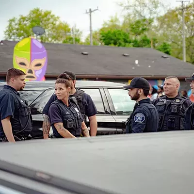 Image: Detroit police scrutinized for heavy-handed tactics at Cinco de Mayo festival