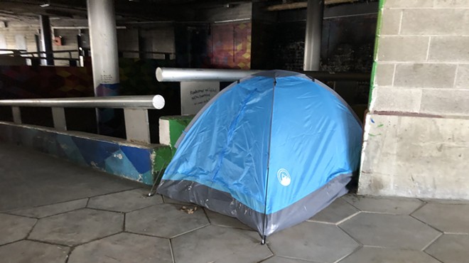 A tent in the underground part of Detroit's Hart Plaza.