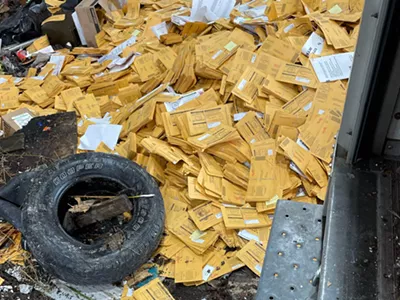 Thousands of absentee ballot envelopes were unloaded at a dump in Detroit.