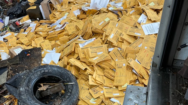 Thousands of absentee ballot envelopes were unloaded at a dump in Detroit.