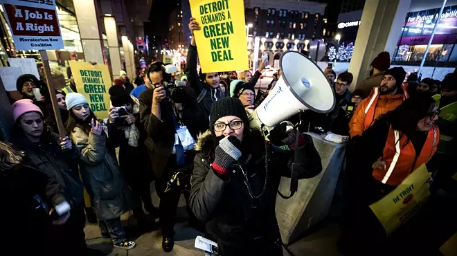 Detroit congresswoman Rashida Tlaib takes to the megaphone at a Green New Deal demonstration earlier this year.