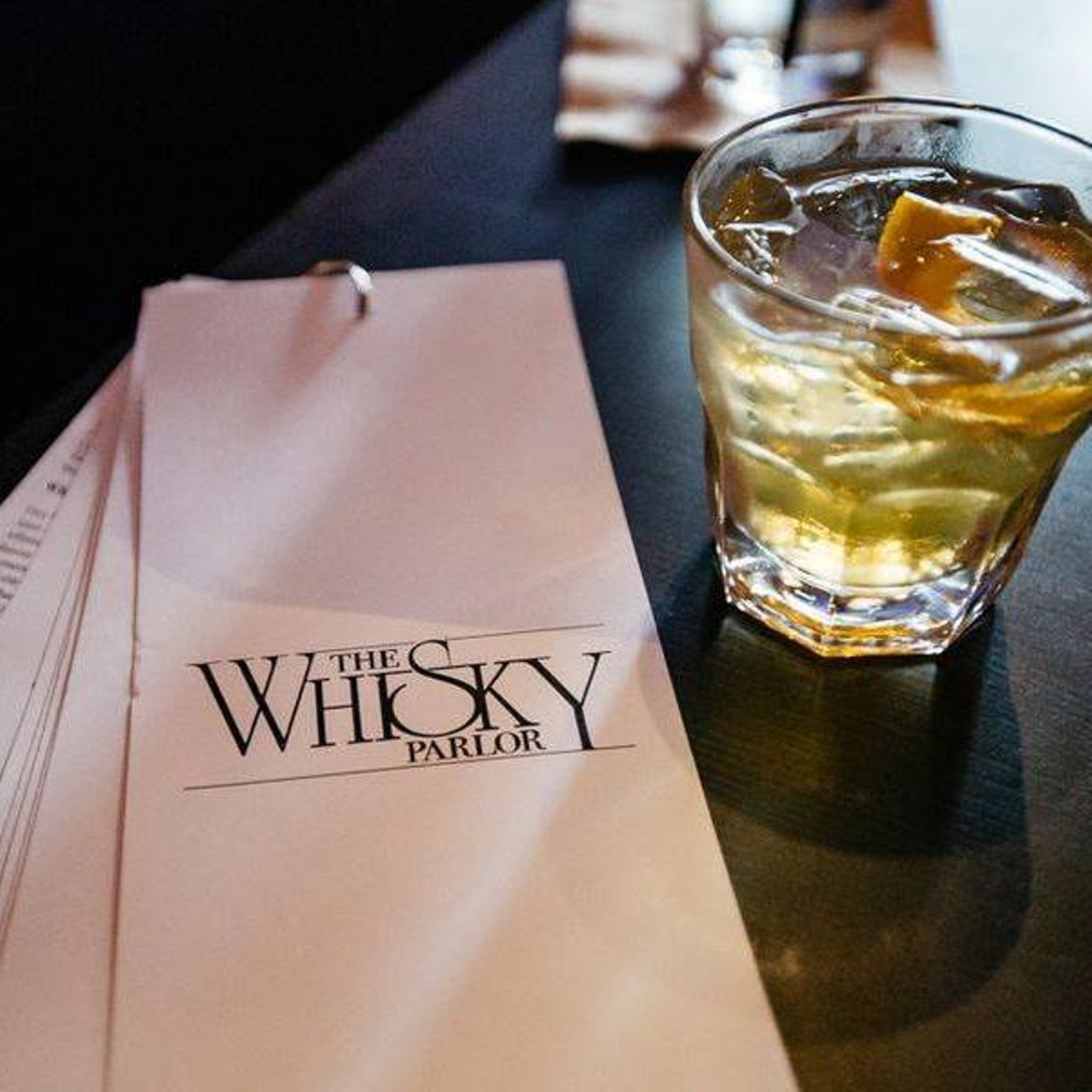5. The Whiskey Parlor608 Woodward Ave., DetroitLow lighting, a wall of whiskeys, and free live music sum up a night at the Whisky Parlor. Leather couches and small tables are scattered across the bar and face toward the stage. If a speakeasy vibe and a whisky in hand is your thing, this is definitely your spot. 
Photo via  The Whiskey Parlor / Facebook 