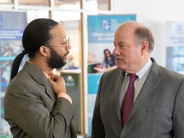 Detroit’s former “Chief Storyteller” Eric Thomas and Mayor Mike Duggan in 2020.
