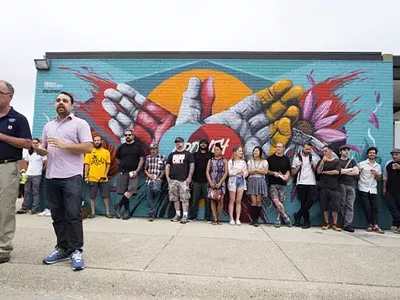 Eastern Market director Dan Carmody, left, and 1xRUN co-founder Jesse Cory announce the artists for the Murals In The Market festival in 2015.