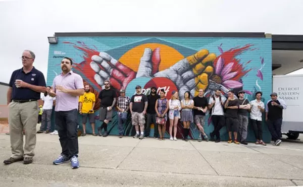 Eastern Market director Dan Carmody, left, and 1xRUN co-founder Jesse Cory announce the artists for the Murals In The Market festival in 2015.