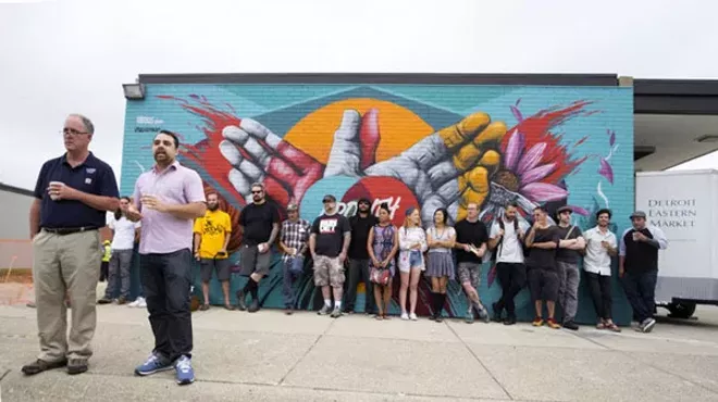 Eastern Market director Dan Carmody, left, and 1xRUN co-founder Jesse Cory announce the artists for the Murals In The Market festival in 2015.