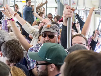 A crowded QLine car.