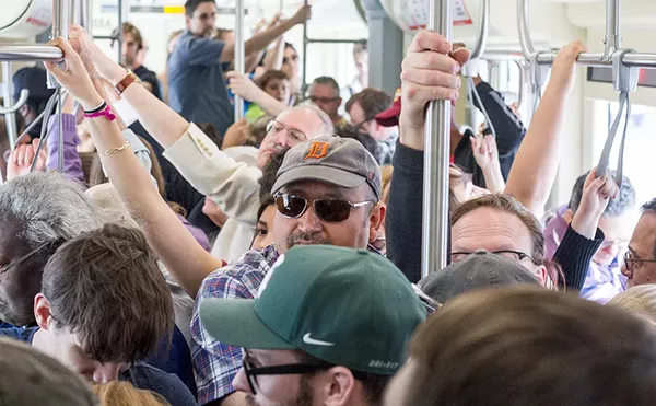 A crowded QLine car.