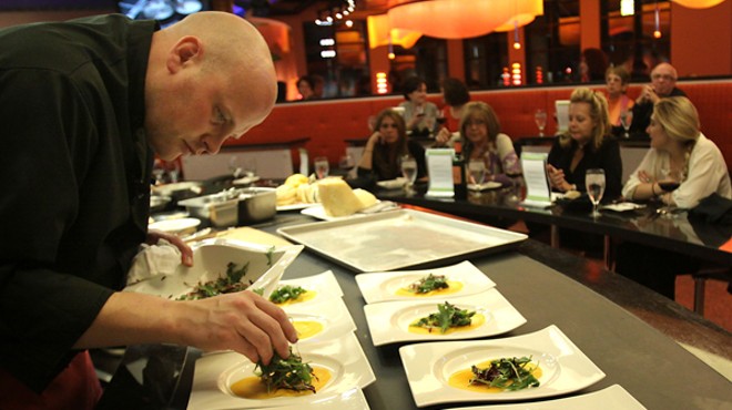 Zazios' executive chef Matt Schellig cooks at the Chef's Table for a group of diners