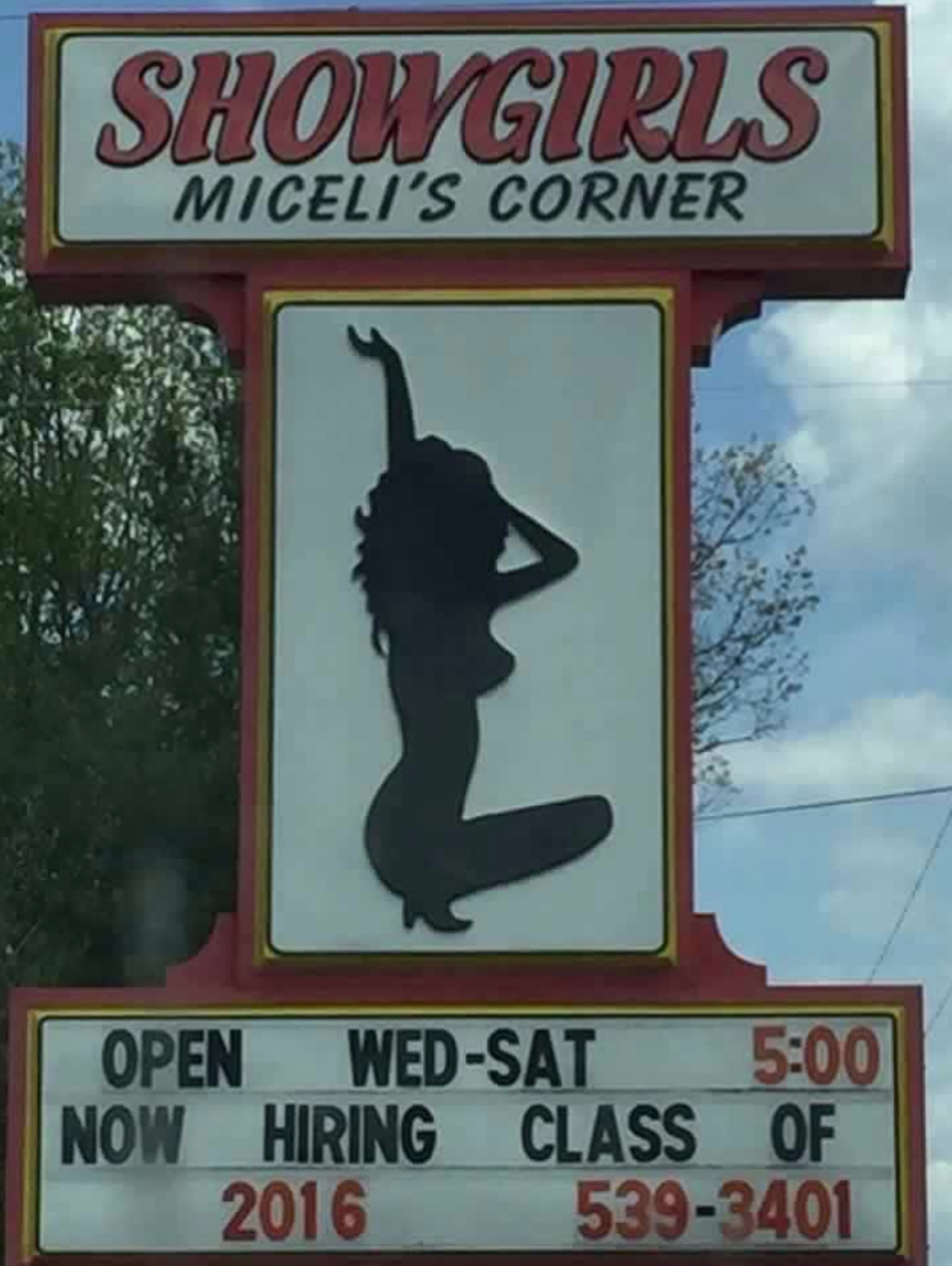 That's not how you get a bachelor's degree
Speaking of free speech, just because you can say something doesn't always mean you should. In May, Harrison strip club Miceli's Corner updated its street sign to say "Now Hiring Class of 2016," seemingly encouraging graduates of the local high school to apply. Some residents think that was not the right message to be sending to their youths. "Children fresh out of high school shouldn't be taking their clothes off for money," one resident tells Saginaw's WNEM. "In no way were we trying to offend anybody," Miceli's management later told WNEM in a statement. "The sign was simply a joke."