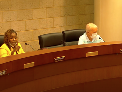 Eastpointe Mayor Monique Owens (left) berated residents during the public comment period of a public meeting.