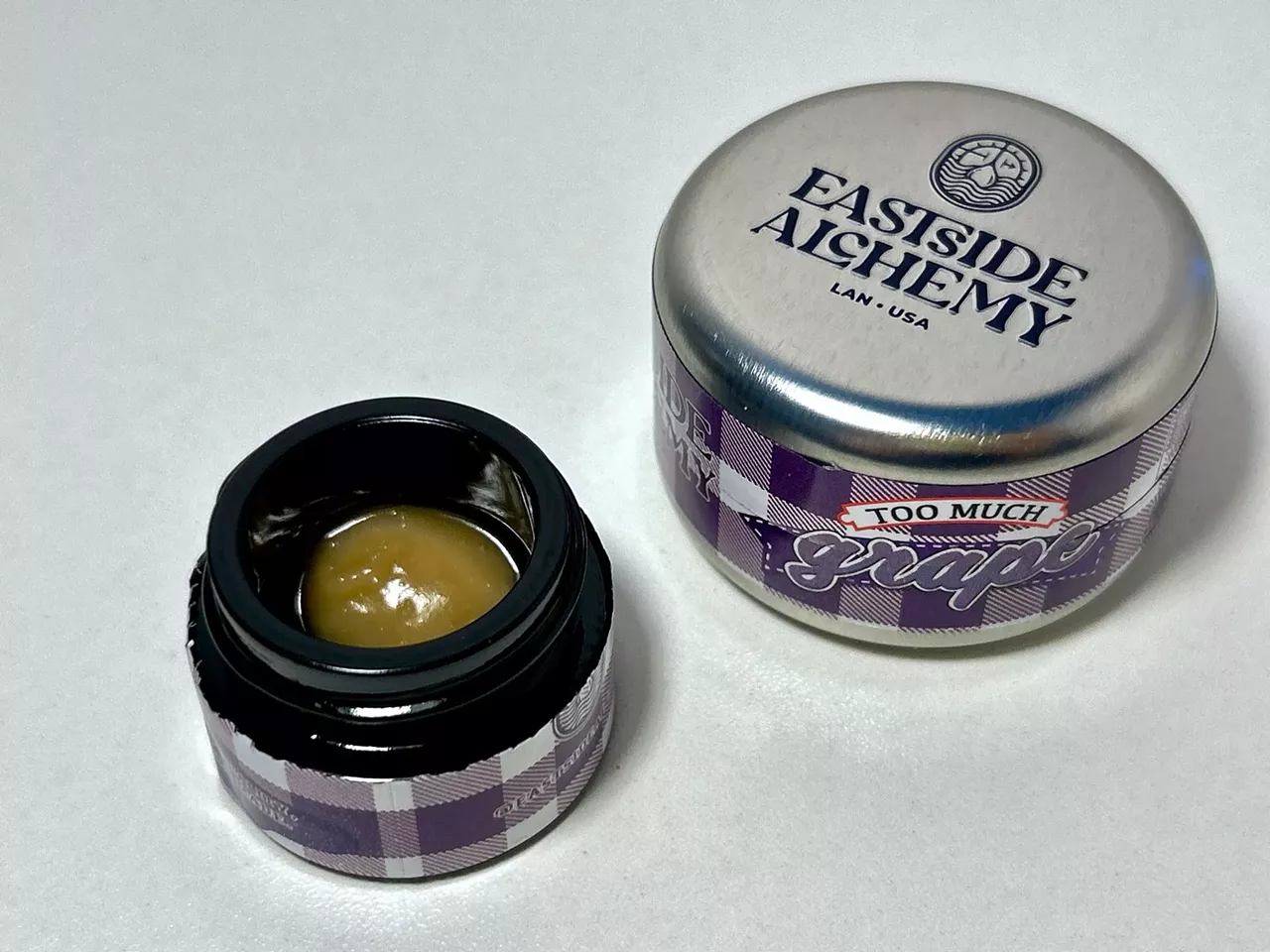 Too Much Grape Loud and unmistakable, this cross of TMZ and Grape Pie opens with a sharp, sugary grape aroma. The texture of Too Much Grape is a wet, soft, and creamy badder that’s easy to handle. The high starts behind the eyes and creeps into a relaxing buzz. Perfect for a night at home.