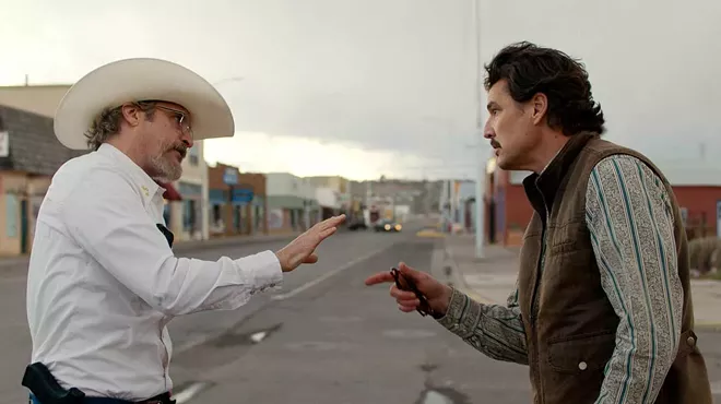 Joaquin Phoenix and Pedro Pascal in Eddington.