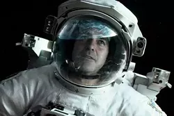 Edge-of-your-seat action sequences alternate with the poetry of looking down at our planet in Gravity.