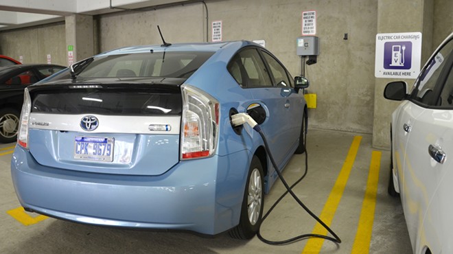 A car being charged at an electric vehicle charger in Ann Arbor.