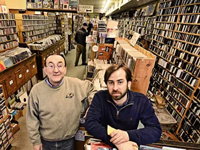 Enocore's Peter Dale with employee-musician Tadd Mullinix.