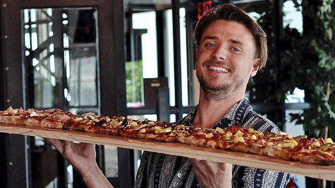 You can enjoy an 8-ft. pizza with your favorite sports game at Rochester Hills Social (2)