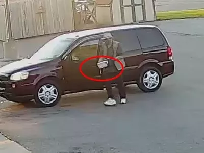 John Douglas Allen is shown carrying a box containing a bomb, FBI says.