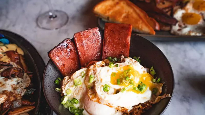 Tigerlily’s new weekend brunch menu includes a Pacific islands twist on breakfast favorites, like Eggs Benedict served over a bao bun with spam.