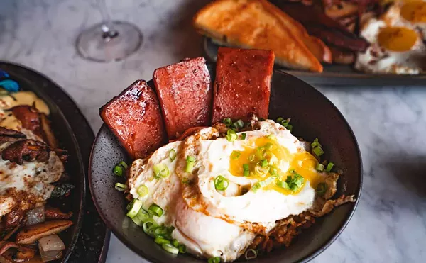 Tigerlily’s new weekend brunch menu includes a Pacific islands twist on breakfast favorites, like Eggs Benedict served over a bao bun with spam.